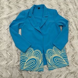 Aqua and yellow coat size XS.